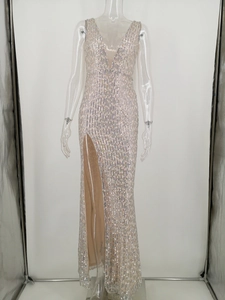 Detail of deep V-neck and sparkling silver sequins on the slim-fit evening gown