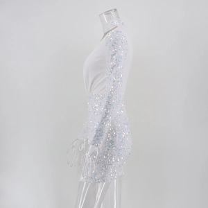 Detail of white sequin mini dress with hollow neckline and sparkling colorful sequins