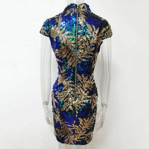 Close-up of back view showing hidden zipper on blue and gold sequin leaf dress