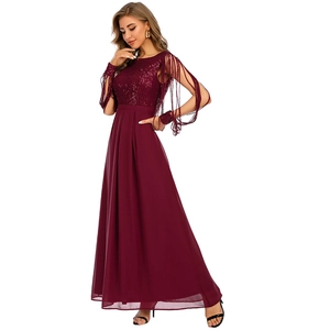 Elegant wine red evening gown featuring sequined bodice and fringe sleeve details