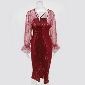 Detail of wine red sequin evening dress showing back view with mesh lace and slit hem