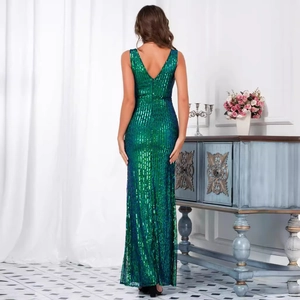 Elegant emerald green sequin backless evening gown with a slim fit and V-neck silhouette