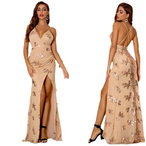 Elegant backless sequin dress with deep V-neck and high slit for evening parties