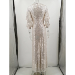 Detailed back view of shimmering sequin long-sleeved evening gown with hidden zipper