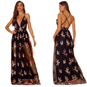 Elegant black evening gown with V-neck, open back, and gold sequin floral embroidery