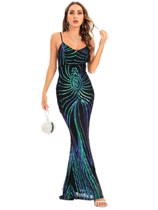 Detail of sequin evening dress showing green and blue peacock patterns and fishtail hem