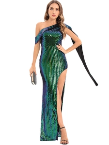 Detail of high side slit and gradient green sequins on a one-shoulder evening gown