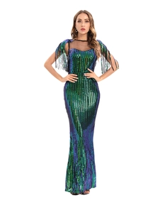Detail of green and purple sequins with sheer mesh neckline and black shoulder fringe