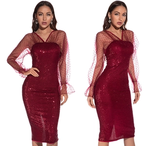 Elegant wine red sequin evening dress with sheer mesh sleeves and polka dot accents