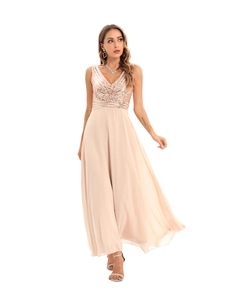 Detail of sequined deep V-neck and layered chiffon skirt on a champagne evening gown