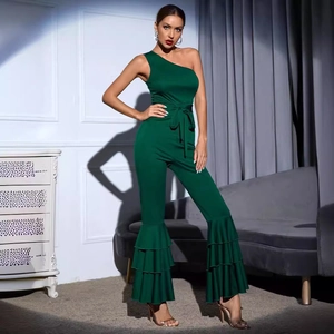 Sexy dark green one-shoulder jumpsuit with layered ruffle hem and matching waist belt