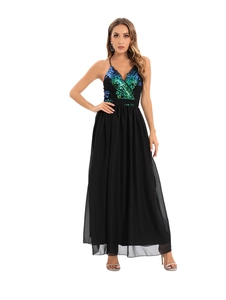 Detail of V-neck sequined bodice with green gradient and flowing black chiffon skirt