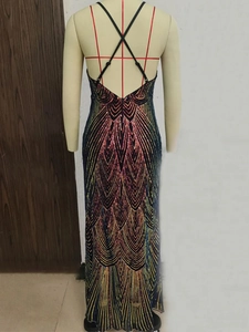 Detail of cross halter backless maxi dress with colorful sequin feather patterns