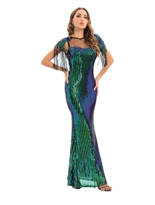 Detail of green sequin mermaid gown with fringe shoulders and sheer mesh neckline