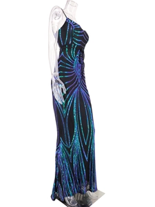 Detailed view of peacock blue and emerald green sequins on the sexy backless mesh evening dress