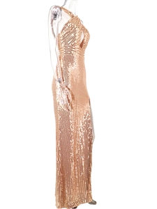 Detail of rose gold sequin evening gown showing vertical shimmering pattern and long hemline