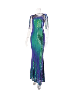 Detailed macro view of green and purple gradient sequins on the slim evening gown