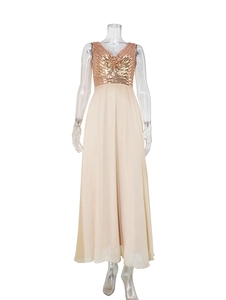 Detailed view of sleeveless V-neck evening gown with golden sequins and chiffon skirt
