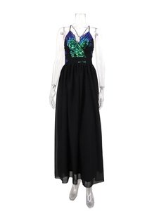 Detail of the plunging V-neck sequin bodice on a backless black chiffon maxi party dress