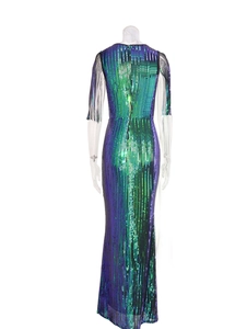Detail of gradient green sequins and hidden back zipper on the slim evening gown