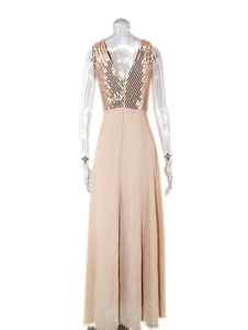 Deep V-back evening dress with metallic sequins and long flowing champagne chiffon skirt