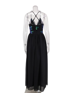 Detailed back view of a black backless maxi dress with teal sequin floral embroidery