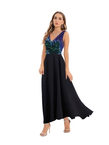 Detailed view of sexy V-neck sequined bodice and flowing black skirt of a long evening gown