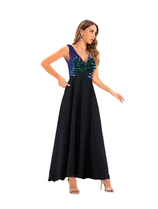 Close-up of sequin V-neck bodice with blue and green patterns on an elegant evening gown