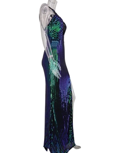 Detail of multi-color sequined dress with deep slit and gradient stripe pattern