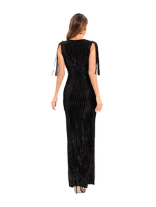 Close-up of black sequined evening dress featuring elegant shoulder fringe and slim fit
