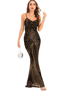 Detail of elegant black and gold sequin mermaid dress with intricate scroll patterns