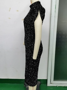 Detailed side view of black sequined bodycon dress with mock neck on mannequin