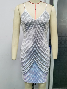 Close-up of zigzag sequin embroidery on white V-neck strap bodycon mini party dress