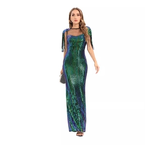 Sparkling green sequin gown with mesh neckline and tassel shoulders for evening events