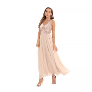Sleeveless V-neck evening gown with sequins and flowing chiffon skirt in apricot color