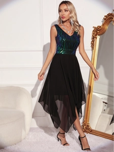 Detail view of shimmering blue-green sequins on a sleeveless dress with a black chiffon hem