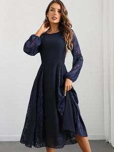Elegant navy blue A-line dress featuring sheer lace sleeves and chiffon patchwork detail