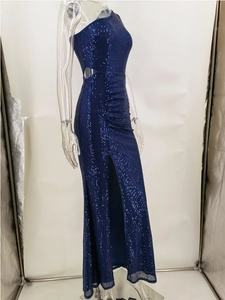 Detail of navy blue sequin dress featuring one shoulder cut and waist hollow out