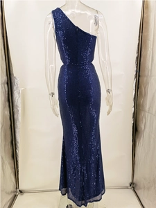 Detailed back view of a dark blue sequined dress with one-shoulder and waist cut-outs