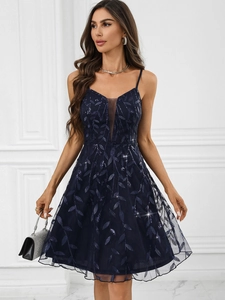 Detail of navy blue sequin leaf embroidery and deep V-neck mesh splice on the party dress