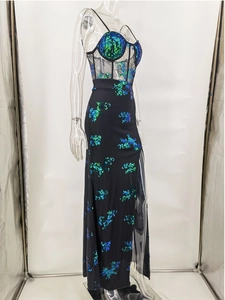 Detailed side view of sequin dress featuring sheer mesh waist and high side slit detail