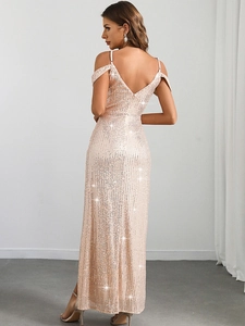 Elegant champagne sequin evening gown featuring an off-shoulder V-neck and backless design
