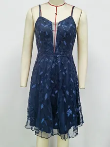 Sparkling dark blue sequin prom dress with deep V-neck and mesh details in a midi length