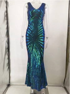 Detail of teal sequin maxi dress with backless V-neck and geometric sunburst pattern