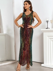 Close-up of sequined long evening dress with colorful fan-shaped geometric patterns