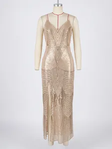Elegant gold sequin V-neck evening gown with spaghetti straps and a high side slit