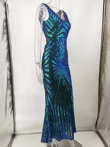 Detail of radial geometric sequin patterns and mesh texture on a backless evening dress