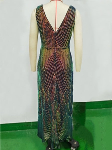 Detail view of the rainbow gradient sequin geometric pattern on the deep V-neck evening dress