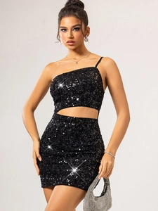 Detail shot of the side cutout and black sequins on this sexy bodycon mini dress