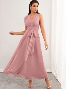 Elegant sleeveless dusty pink chiffon maxi dress with cross V-neck and belted waistline